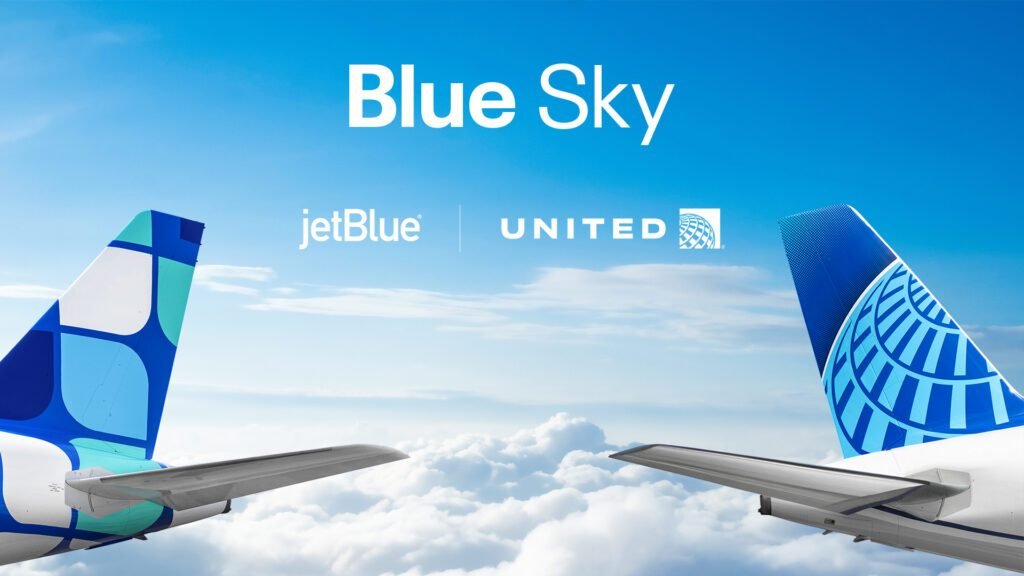 jetBlue and United “Blue Sky” partnership artwork with both tails above the clouds
