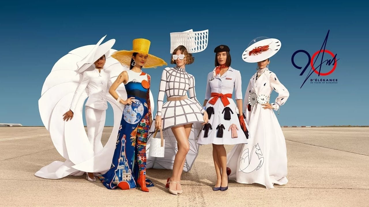 Fashion-inspired looks from the Air France campaign lined up on the apron