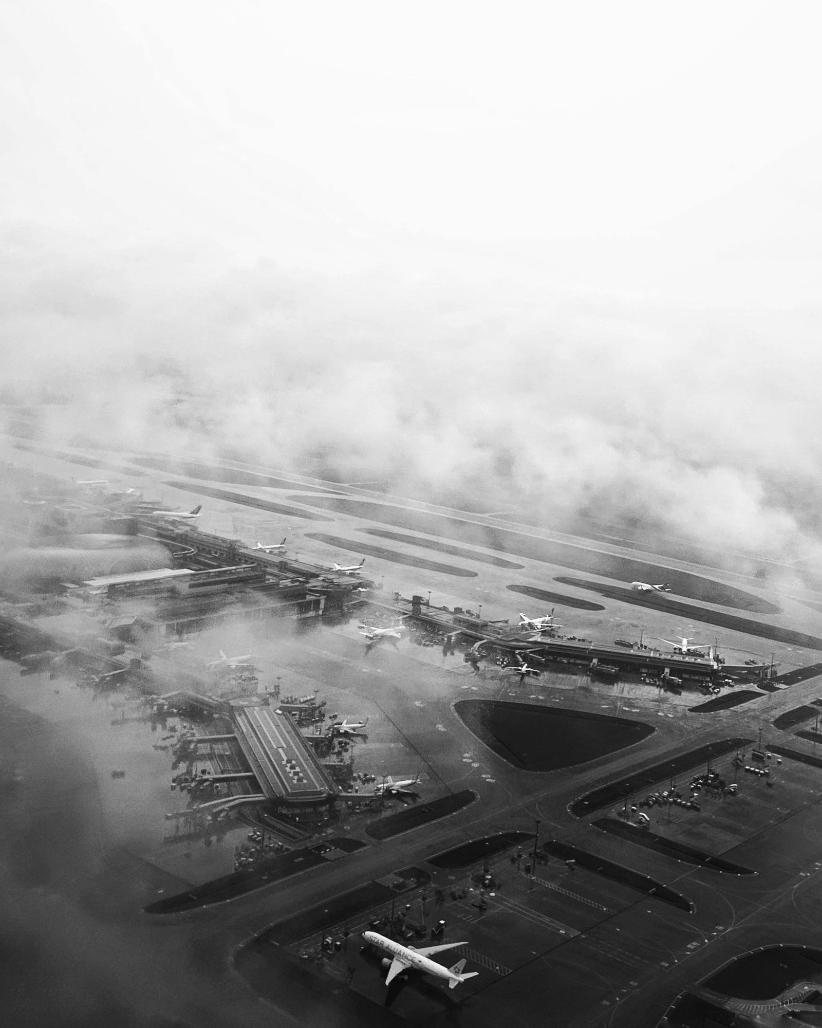 Aerial view of an airport through the clouds