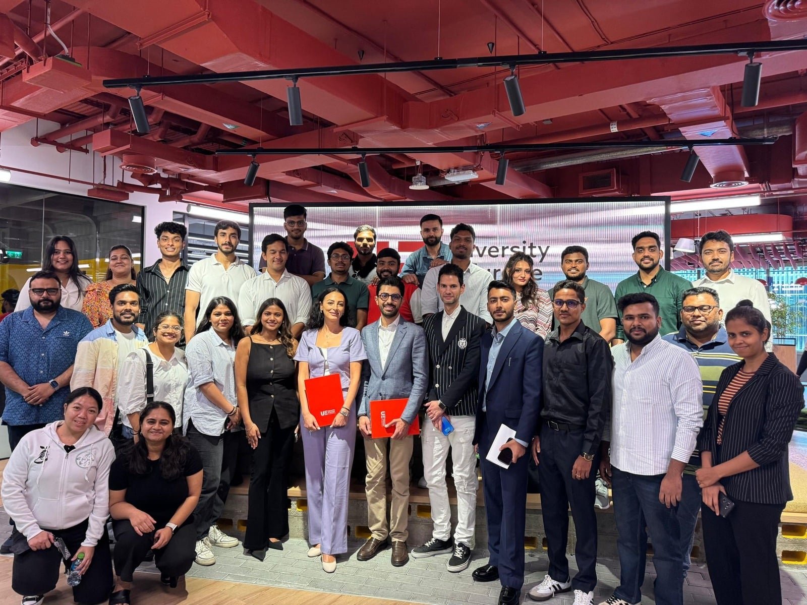 Oways Saleh with students at the University of Europe for Applied Sciences in Dubai
