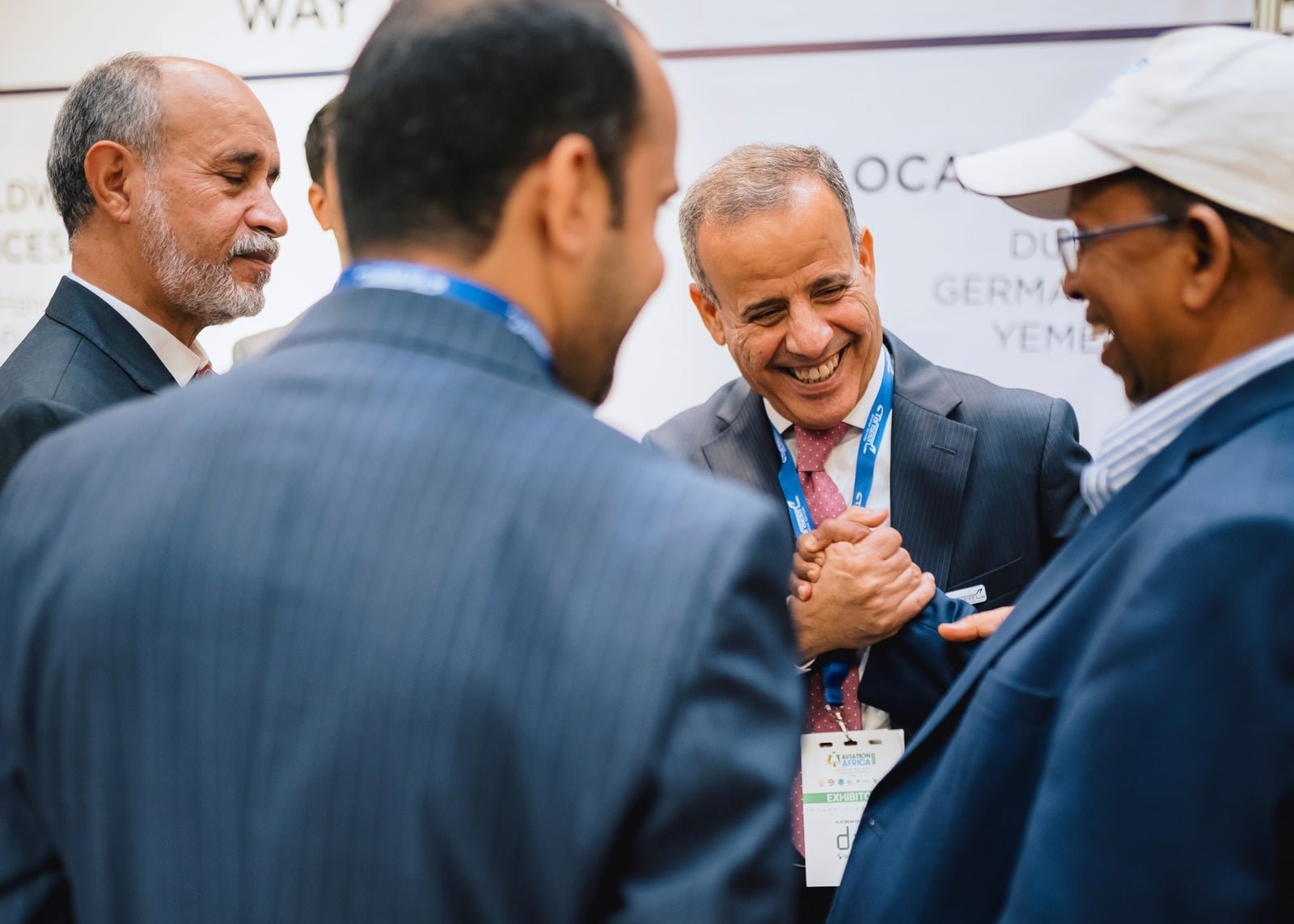 Delegates networking at an aviation event